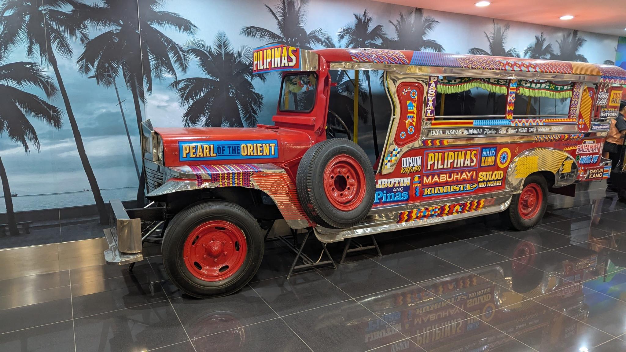 ../../../../_images/ph2025-day0-naia3-jeepney.jpg